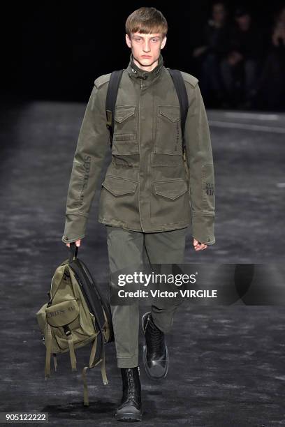 Model walks the runway at the Neil Barrett show during Milan Men's Fashion Week Fall/Winter 2018/19 on January 13, 2018 in Milan, Italy.