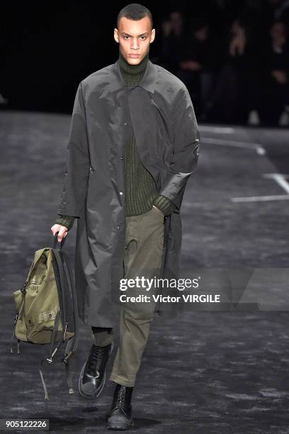 Model walks the runway at the Neil Barrett show during Milan Men's Fashion Week Fall/Winter 2018/19 on January 13, 2018 in Milan, Italy.