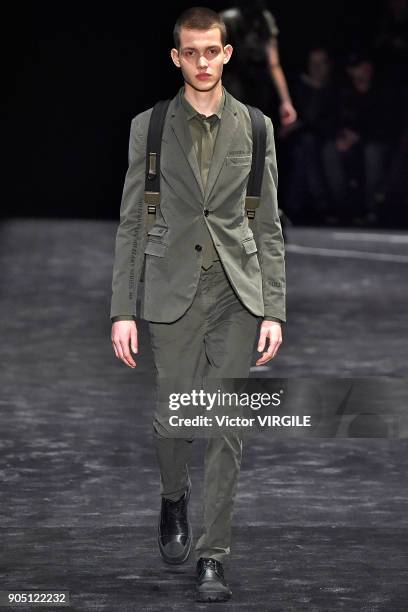 Model walks the runway at the Neil Barrett show during Milan Men's Fashion Week Fall/Winter 2018/19 on January 13, 2018 in Milan, Italy.