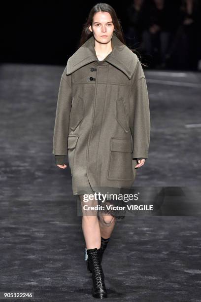 Model walks the runway at the Neil Barrett show during Milan Men's Fashion Week Fall/Winter 2018/19 on January 13, 2018 in Milan, Italy.