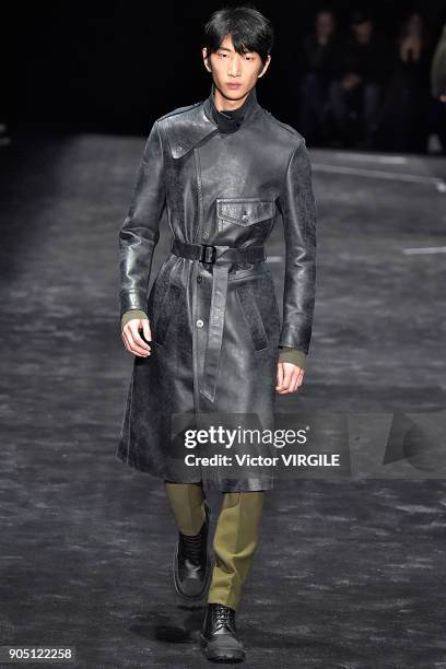 Model walks the runway at the Neil Barrett show during Milan Men's Fashion Week Fall/Winter 2018/19 on January 13, 2018 in Milan, Italy.