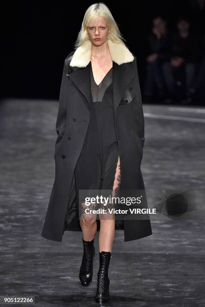 Model walks the runway at the Neil Barrett show during Milan Men's Fashion Week Fall/Winter 2018/19 on January 13, 2018 in Milan, Italy.