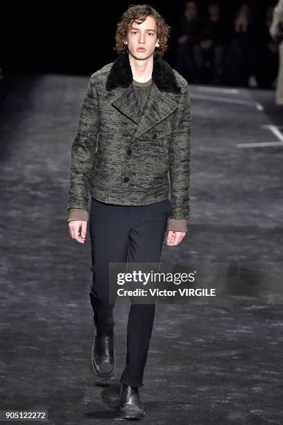 Model walks the runway at the Neil Barrett show during Milan Men's Fashion Week Fall/Winter 2018/19 on January 13, 2018 in Milan, Italy.