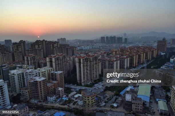 tanzhou town sunset time high angle view - skyline arch stock-fotos und bilder