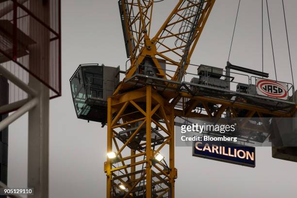 Sign hangs from a crane working on the Barts Square development, operated by Carillion Plc., in London, U.K., on Monday, Jan. 15, 2018. Carillion, a...