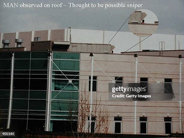 Photograph illustrating a possible sniper on Columbine High School's rooftop April 20, 1999 in Littleton, CO. The photographs of the incident were...