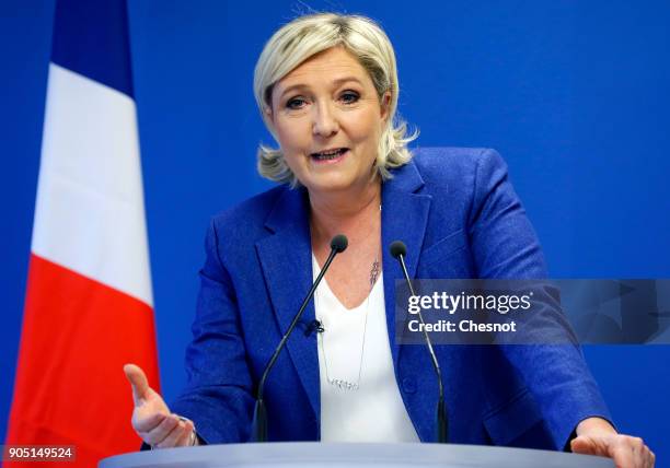 French far-right National Front political party leader, Marine Le Pen delivers her New Year wishes to the media at the party's headquarters on...