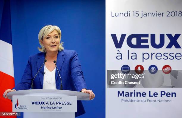 French far-right National Front political party leader, Marine Le Pen delivers her New Year wishes to the media at the party's headquarters on...