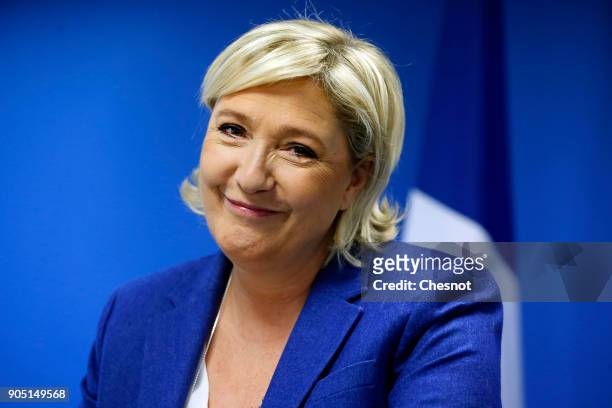 French far-right National Front political party leader, Marine Le Pen delivers her New Year wishes to the media at the party's headquarters on...