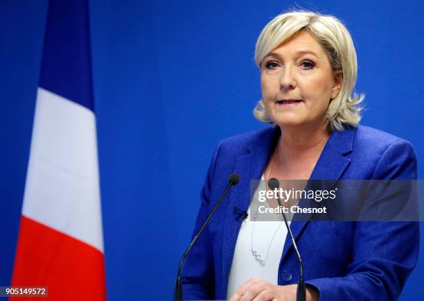 French far-right National Front political party leader, Marine Le Pen delivers her New Year wishes to the media at the party's headquarters on...