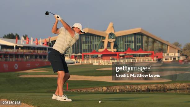 Rory McIlroy of Northern Ireland plays his second shot from the 18th fairway during a practice round ahead of Abu Dhabi HSBC Golf Championship at Abu...