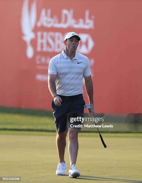 Rory McIlroy of Northern Ireland looks on on the 18th green during a practice round ahead of Abu Dhabi HSBC Golf Championship at Abu Dhabi Golf Club...