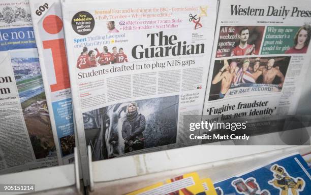 Copy of the new tabloid sized The Guardian newspaper with its new masthead is pictured for sale on January 15, 2018 in Bristol, England. In a...