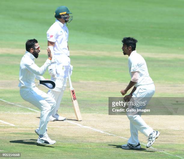 Virat Kohli and Jasprit Bumrah of India celebrate the wicket of Aiden Markram of the Proteas during day 3 of the 2nd Sunfoil Test match between South...