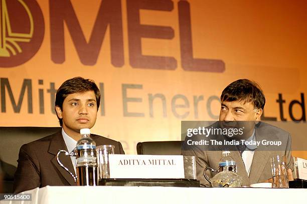 Mittal Chairman and CEO Mittal Steel and Director of ONGC Mittal Energy Ltd with his son, Aditya Mittal during a press conference, in Delhi, India on...