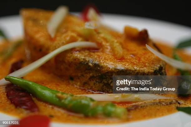 Hilsa fish with cucumber at Oh! Calcutta restaurant, New Delhi.