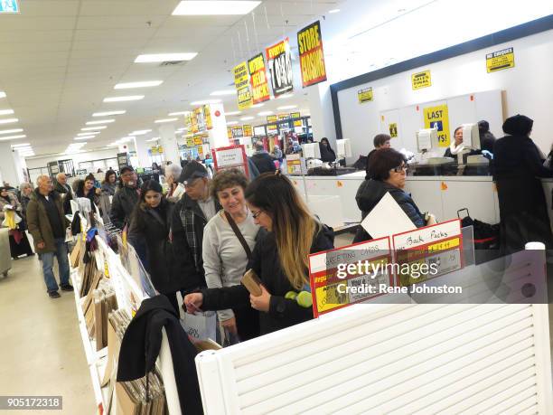 Sears Closing Final . Bargain hunters wait to check out after picking up items at sale prices. The Sears at Erin Mills Town Centre close out sales....