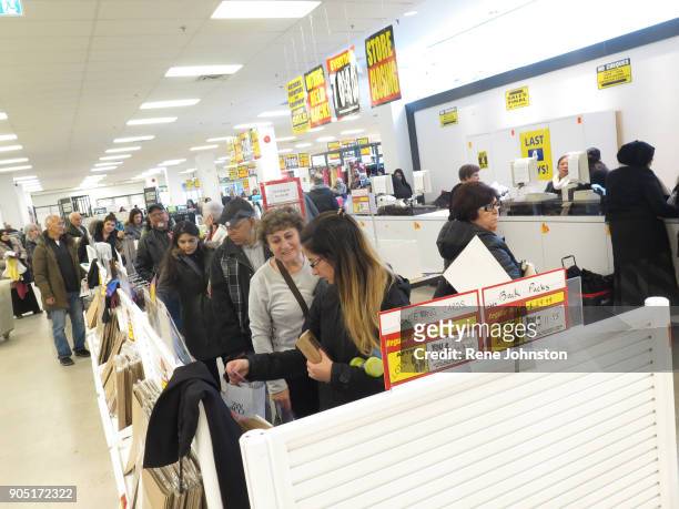 Sears Closing Final . Bargain hunters wait to check out after picking up items at sale prices. The Sears at Erin Mills Town Centre close out sales....