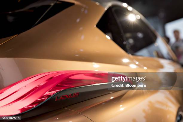Tail light of the Toyota Motor Corp. Lexus LF-1 Limitless crossover concept vehicle is seen during the 2018 North American International Auto Show in...