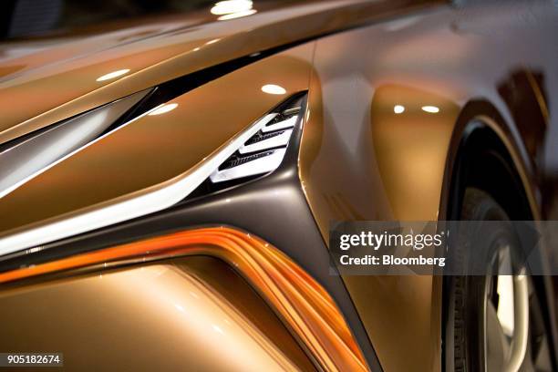 Headlight of the Toyota Motor Corp. Lexus LF-1 Limitless crossover concept vehicle is seen during the 2018 North American International Auto Show in...