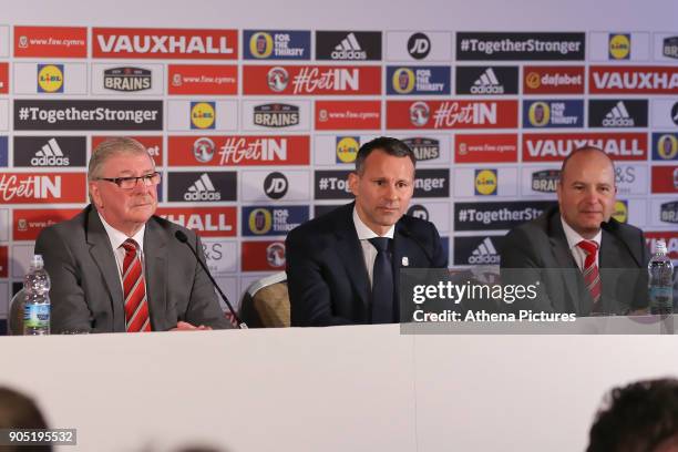 President David Griffiths, Ryan Giggs and Jonathan Ford during a press conference as he is announced as the new manager of Wales at Hensol Castle on...