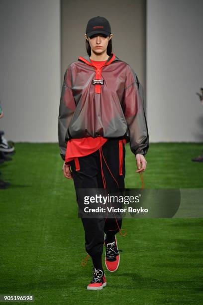 Model walks the runway at the Represent show during Milan Men's Fashion Week Fall/Winter 2018/19 on January 15, 2018 in Milan, Italy.