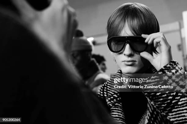 Model is seen backstage ahead of the Fendi show during Milan Men's Fashion Week Fall/Winter 2018/19 on January 15, 2018 in Milan, Italy.