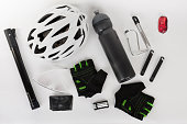 Bike accessories, bike helmet, bike gloves, eyeglasses, bottle in holder