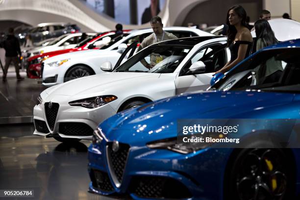 Alfa Romeo Automobiles SpA vehicles are displayed during the 2018 North American International Auto Show in Detroit, Michigan, U.S., on Monday, Jan....