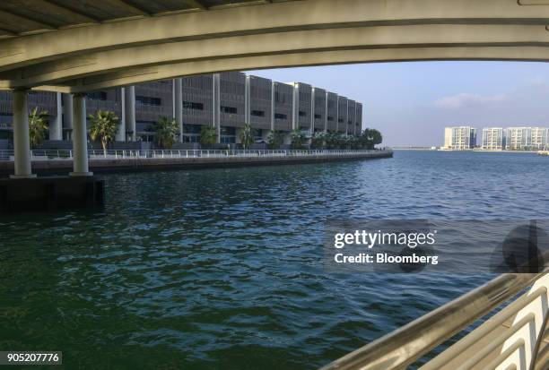 New residential apartment blocks stand in the Al Muneera gated enclave, developed by Carillion Plc and Al-Futtaim Group, along the Al Raha waterfront...