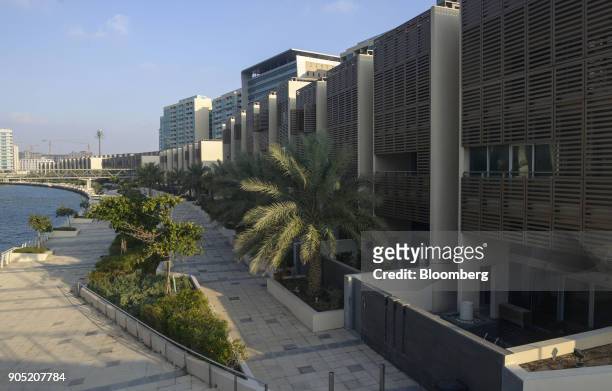 New residential apartment blocks stand in the Al Muneera gated enclave, developed by Carillion Plc and Al-Futtaim Group, along the Al Raha waterfront...