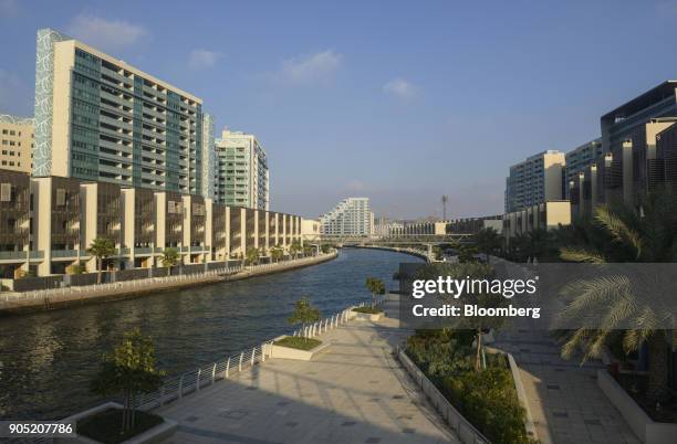 New residential apartment blocks stand in the Al Muneera gated enclave, developed by Carillion Plc and Al-Futtaim Group, along the Al Raha waterfront...