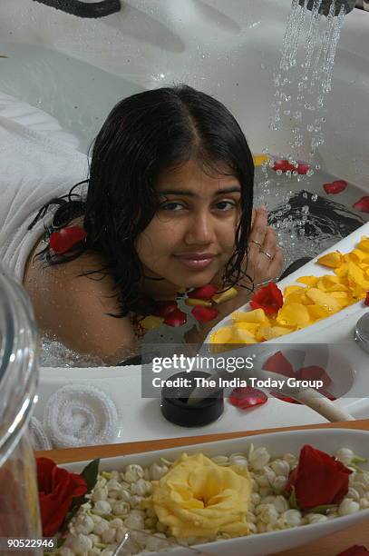 Model Parul in Hydrotherapy tub at Leela Palace in Bangalore, Karnataka, India