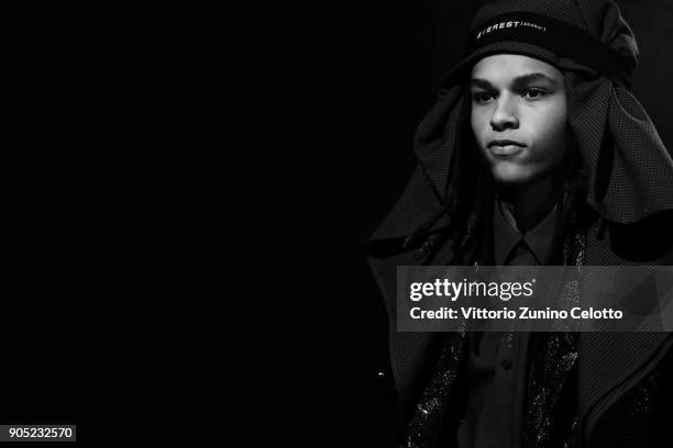 Model is seen backstage ahead of the Yoshio Kubo show during Milan Men's Fashion Week Fall/Winter 2018/19 on January 15, 2018 in Milan, Italy.