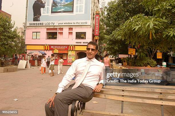 Rajan Mittal, Joint Managing Director, Bharti Tele Ventures Ltd, poses at outdoor location in Delhi, India. Potrait, Sitting