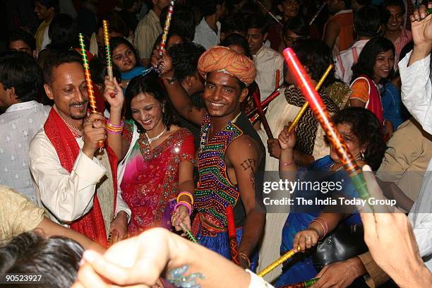 Dandiya dance being played at the Garden of Five Senses during Rhythm 2006 Dandiya Festival , organised by International Institute of Fashion...