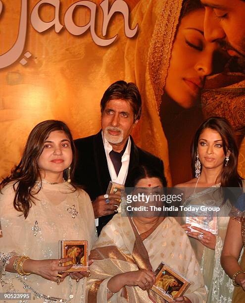 Amitabh Bachchan with Aishwarya Rai, Lata Mangeshkar and Alka Yagnik during the Music launch of Umrao Jaan in Mumbai, Maharashtra, India