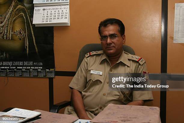 Sub Inspector Sandeep Kumar at Connaught Place Police Station, New Delhi, India.