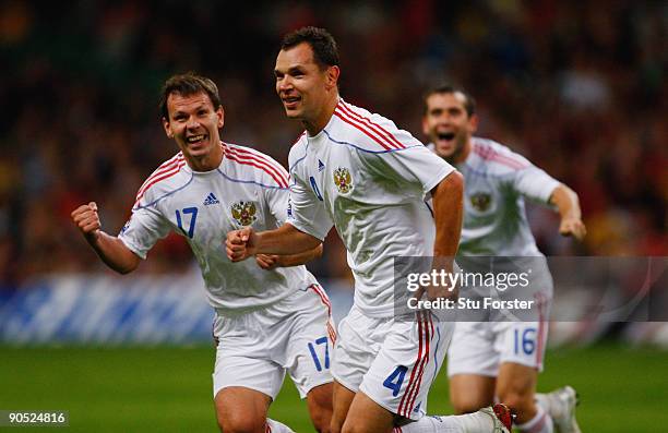 Russia player Sergey Ignashevich celebrates after scoring the second Russia goal during the FIFA 2010 World Cup Qualifier between Wales and Russia at...