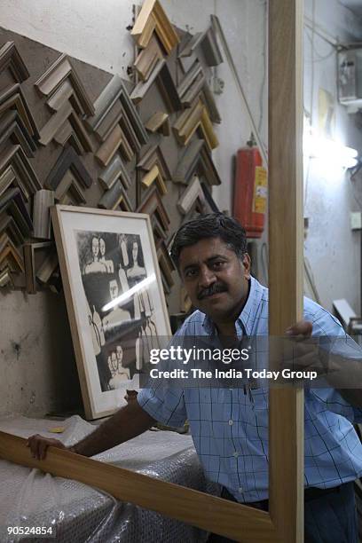 Murti Ahuja, framer and owner of Ahuja Framers in Paharganj, New Delhi.