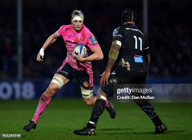 Jonny Hill of Exeter Chiefs takes on Nemani Nadolo of Montpellier during the European Rugby Champions Cup match between Exeter Chiefs and Montpellier...