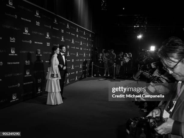 Prince Carl Philip the Duke of Varmland and Princess Sofia of Sweden the Duchess of Varmland walk the red carpet when arriving at Idrottsgalan, the...