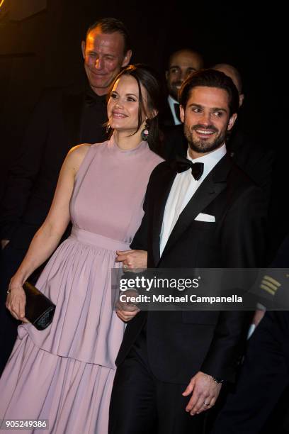 Prince Carl Philip the Duke of Varmland and Princess Sofia of Sweden the Duchess of Varmland walk the red carpet when arriving at Idrottsgalan, the...