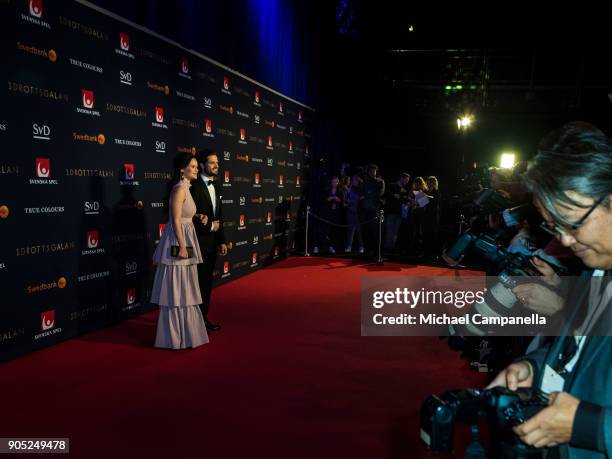 Prince Carl Philip the Duke of Varmland and Princess Sofia of Sweden the Duchess of Varmland walk the red carpet when arriving at Idrottsgalan, the...