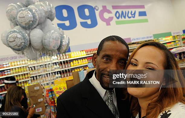 Adrienne Rounds and Brad Pye smile after their 99 cent wedding ceremony at the 99 cent store in Los Angeles on September 9, 2009. The budget...