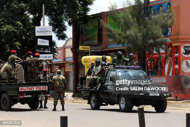 Zambian riot police officers patrol in the streets of Lusaka, on January 15 during march of Zambian traders and vendors to protest over a ban on...