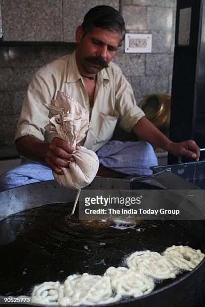 Jalebi being made in Old Famous Jalebi Wala shop at Chandni Chowk.