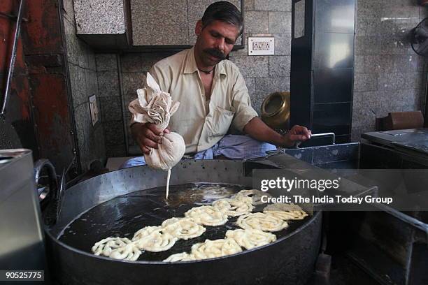 Jalebi being made in Old Famous Jalebi Wala shop at Chandni Chowk.