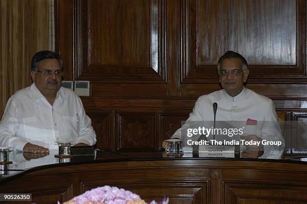 Raman Singh, Chief Minister of Chhattisgarh with Shivraj Patil, Union Cabinet Minister for Home Affairs addressing the Media in New Delhi, India