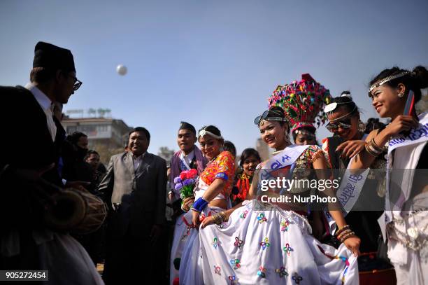 Nepalese Tharu community woman dance in a traditional attire during parade of the Maghi festival celebrations or the New Year of the Tharu community...